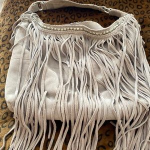 Genuine suede bag in taupe by Sondra Roberts. In excellent condition.